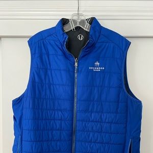 Reversible men’s golf vest. Blue and black.